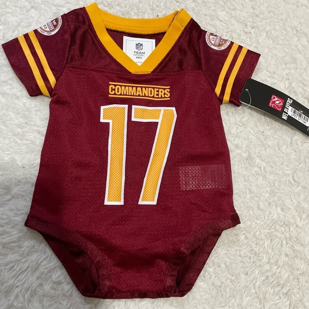 NFL Team Apparel Kids Maroon and Yellow Onesie